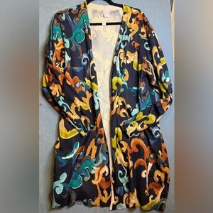 This is a Chico's Scroll Print Cardigan in a navy-based multicolor variant.